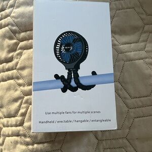 WiHoo Portable Stroller Fan. 

WiHoo Portable Stroller Fan.
